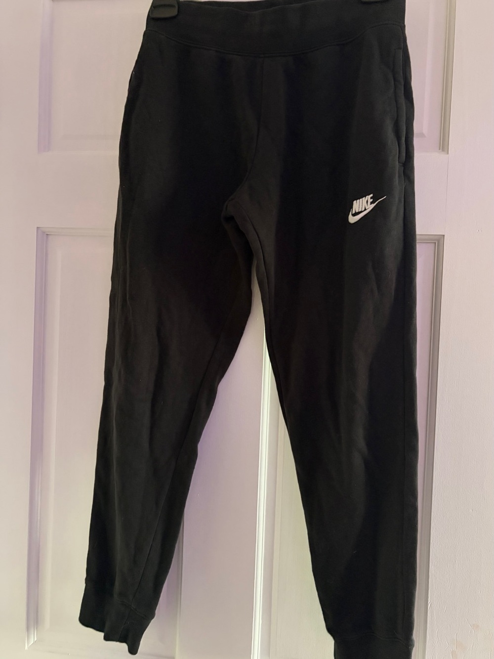 Nike Kids Black Sweatpants with White Swoosh Logo